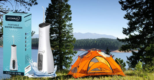 AZZARUS Portable Water Flosser displayed beside a camping tent near a scenic lake—highlighting its cordless design and travel-friendly wellness appeal.