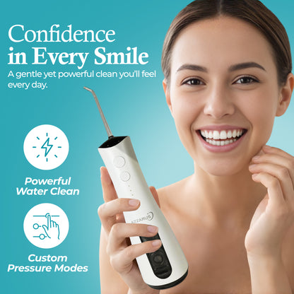 Woman holding AZZARUS cordless water flosser smiling
